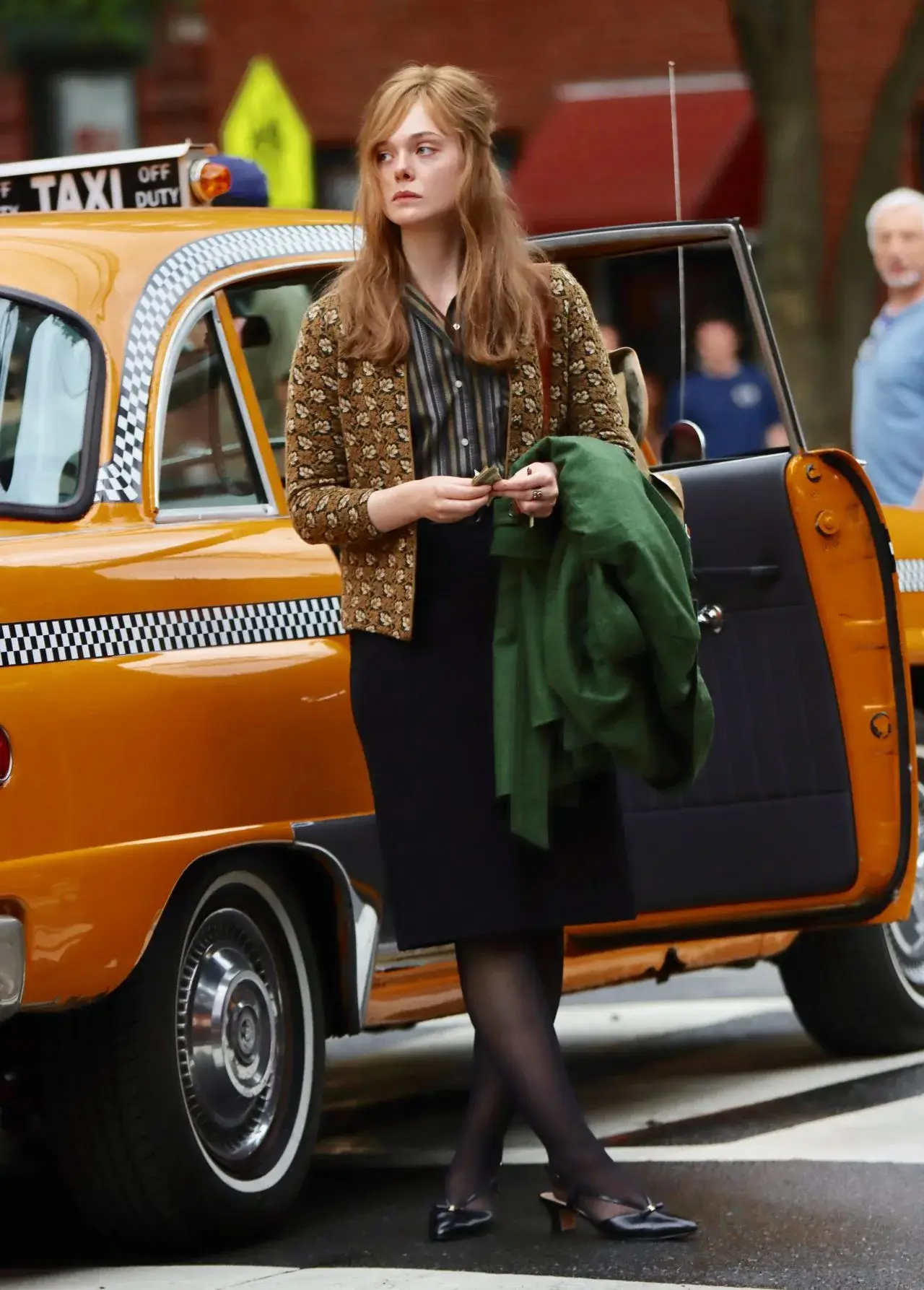 Elle Fanning Stills at A Complete Unknown Filming Set in Hoboken